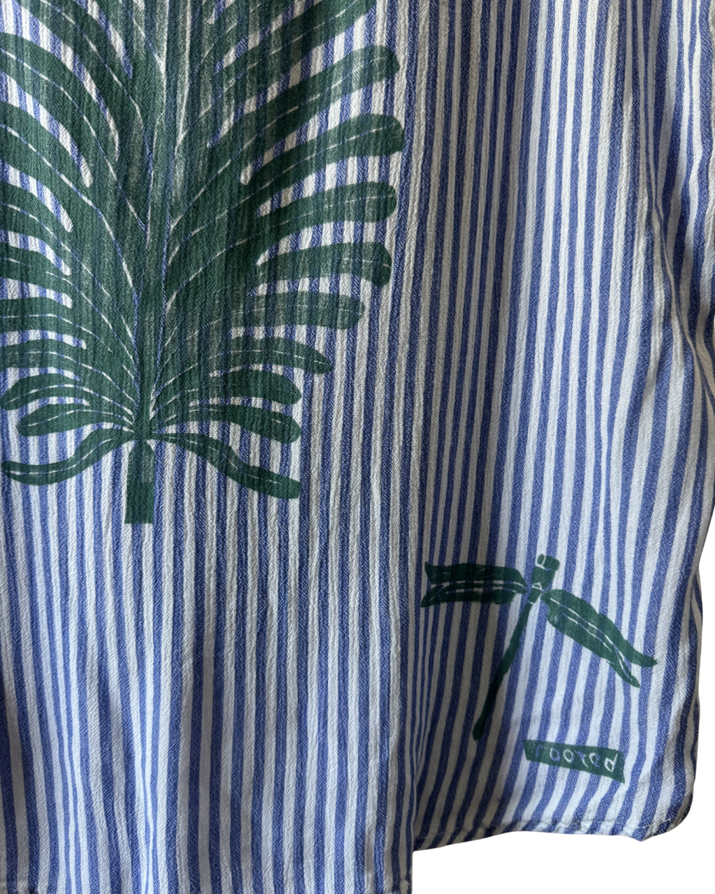 Behind the Palm Frond Top