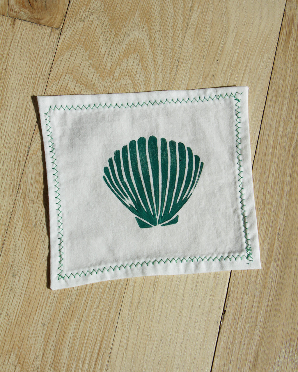 White Cocktail Napkin with Shell